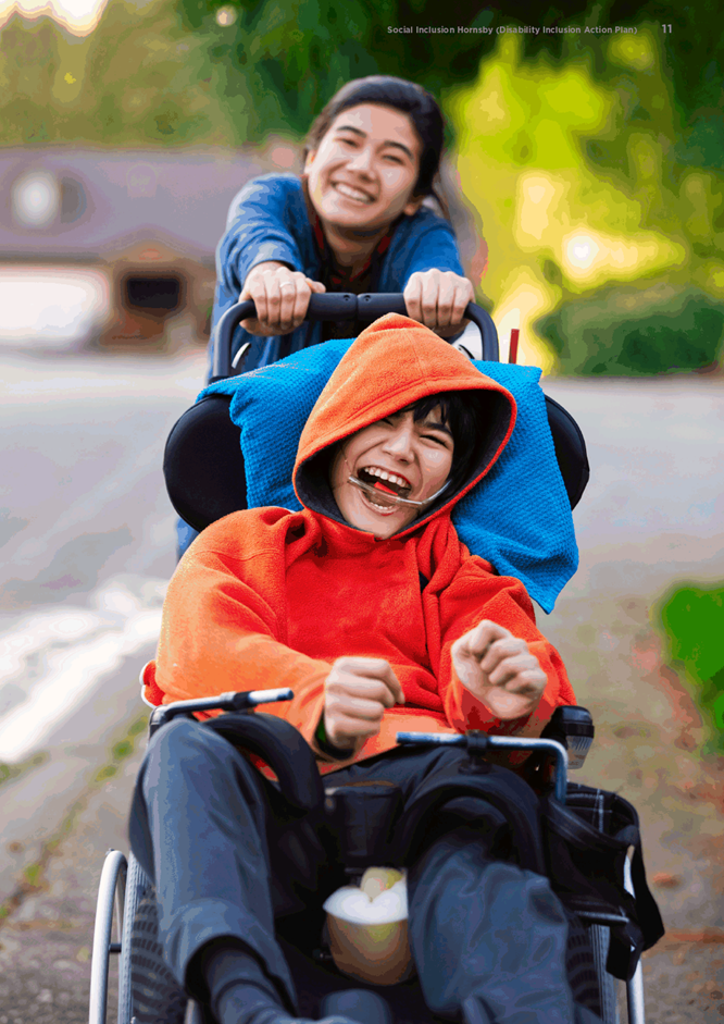 A person pushing a child in a stroller

Description automatically generated with medium confidence
